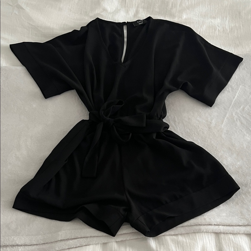 Vici Black romper never worn